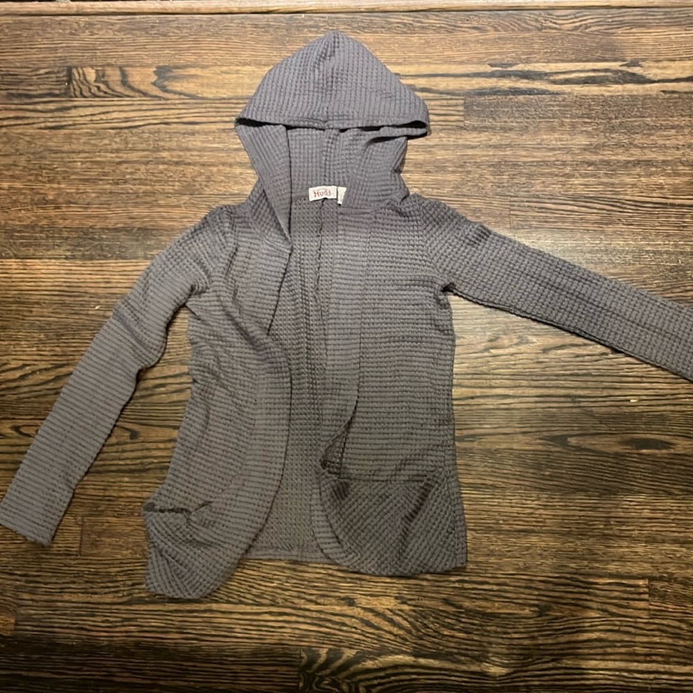 Grey cardigan, soft knit style.